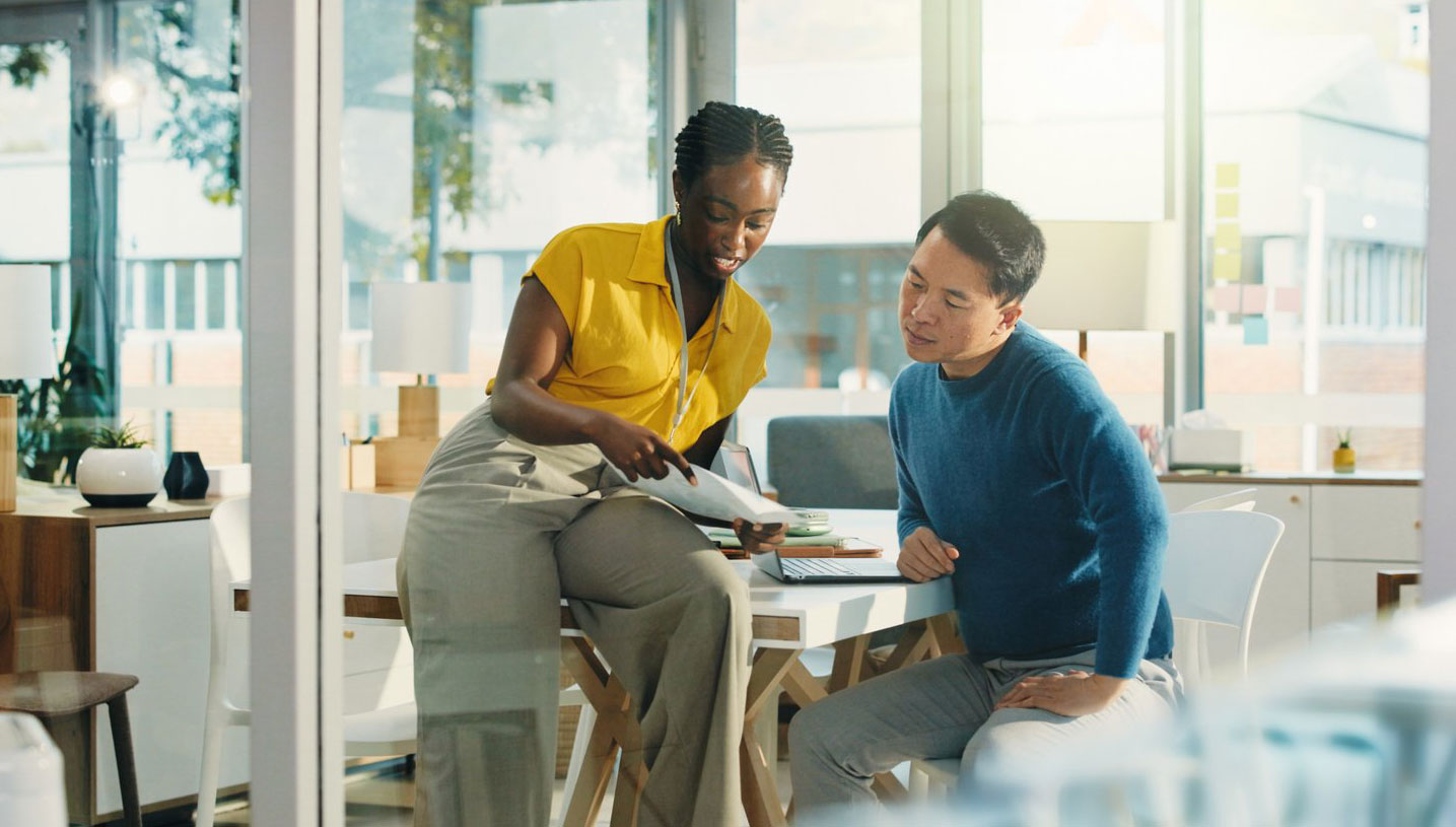 Woman and man in meeting